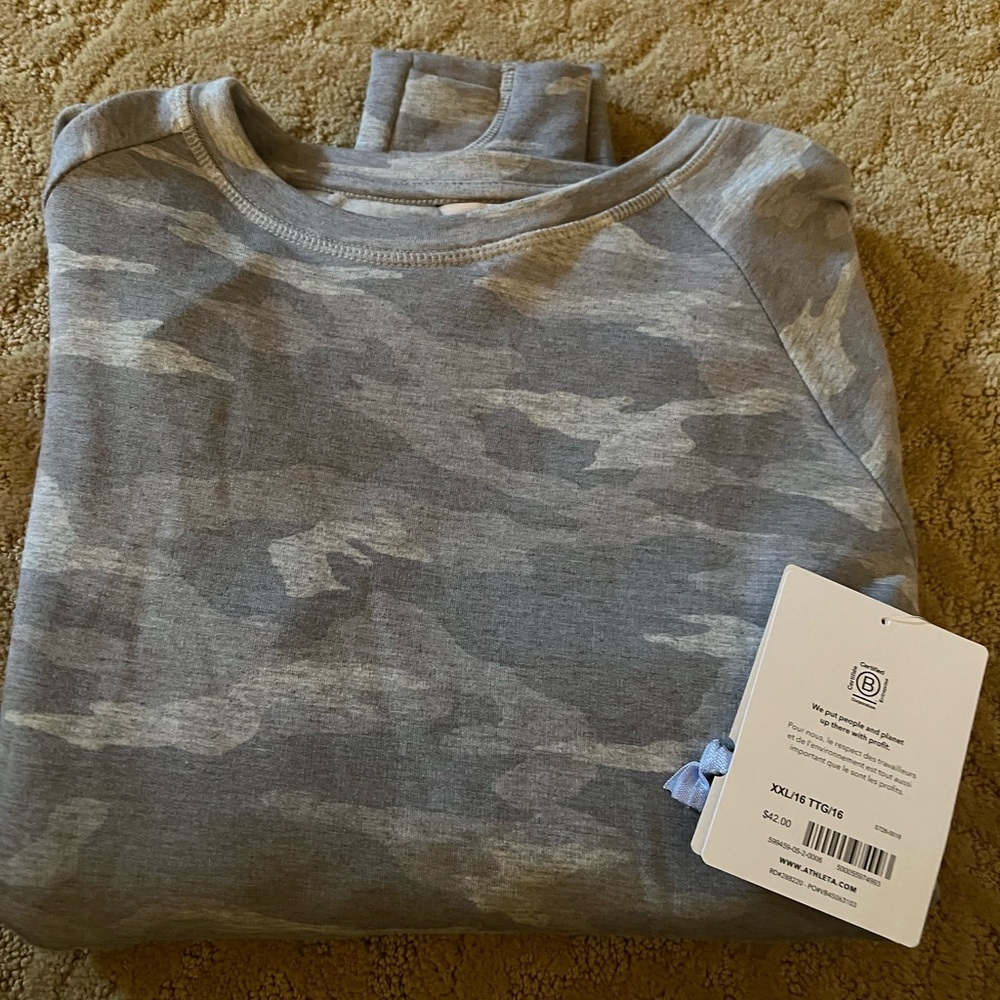 Brand new with tags Athleta sweatshirt-type shirt in camouflage.